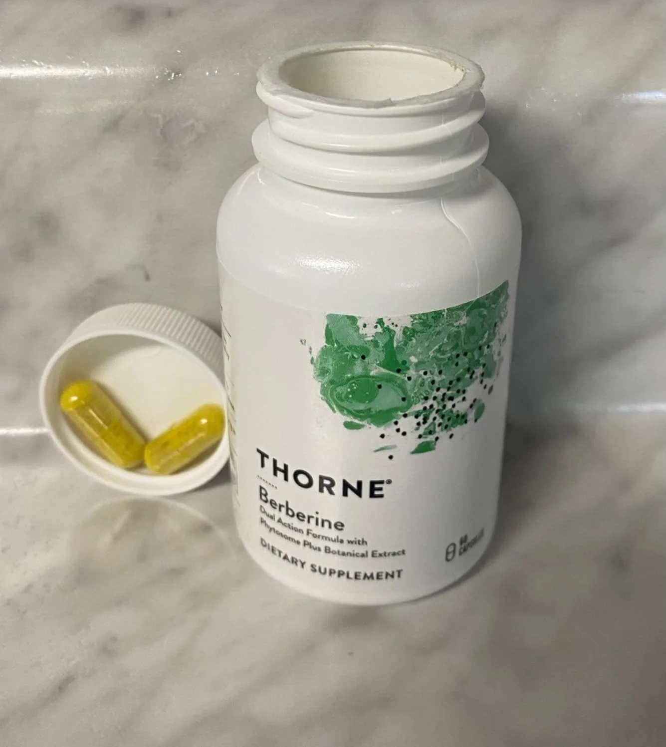 Customer photo of Berberine supplement bottle showing label and capsules