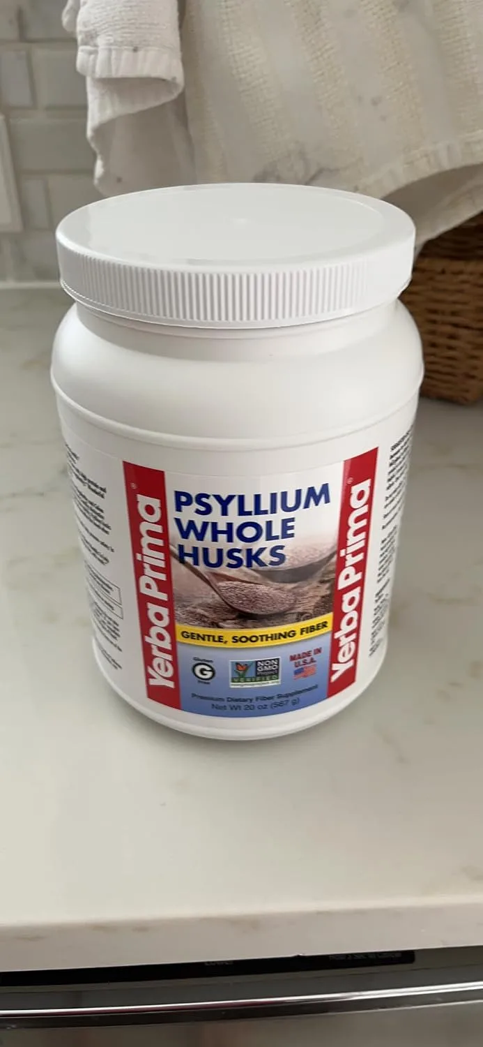 Customer photo of supplement bottle displayed next to packaging and contents