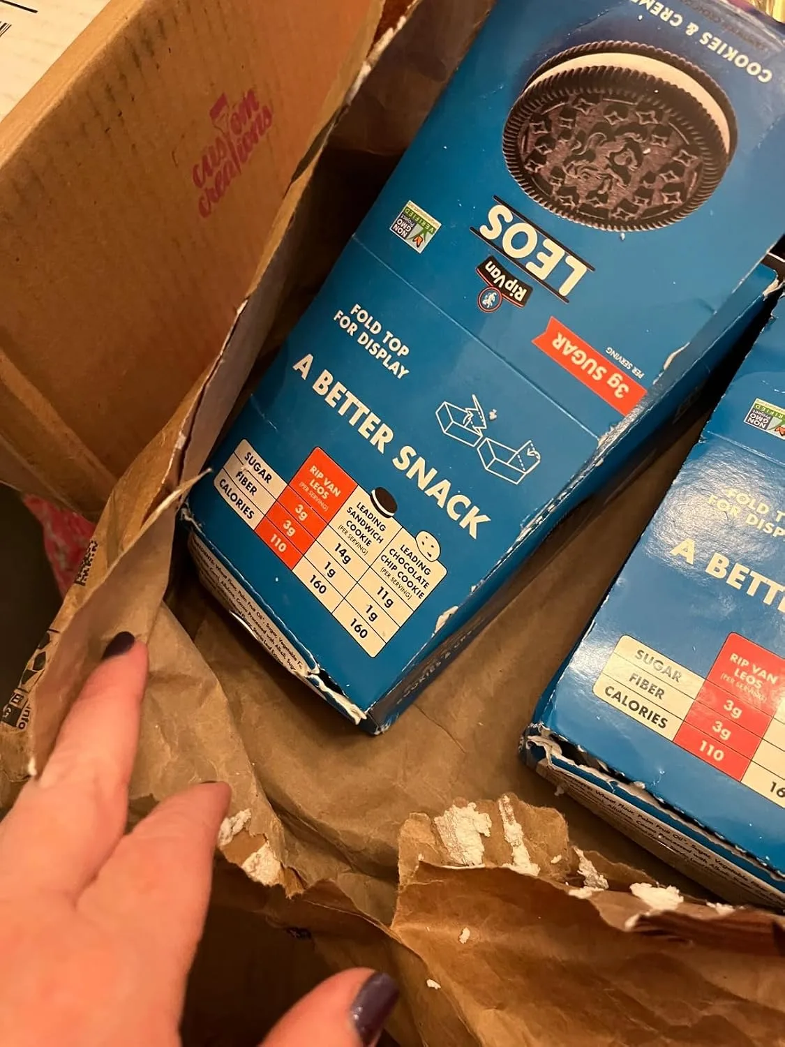 Customer photo of low-GI snack bars displayed in a pantry shelf with other healthy snacks