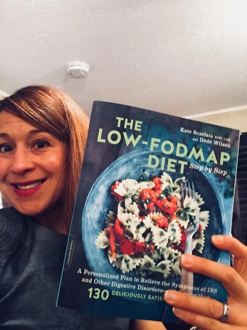 Customer photo of IBS Explained book cover displayed on a table