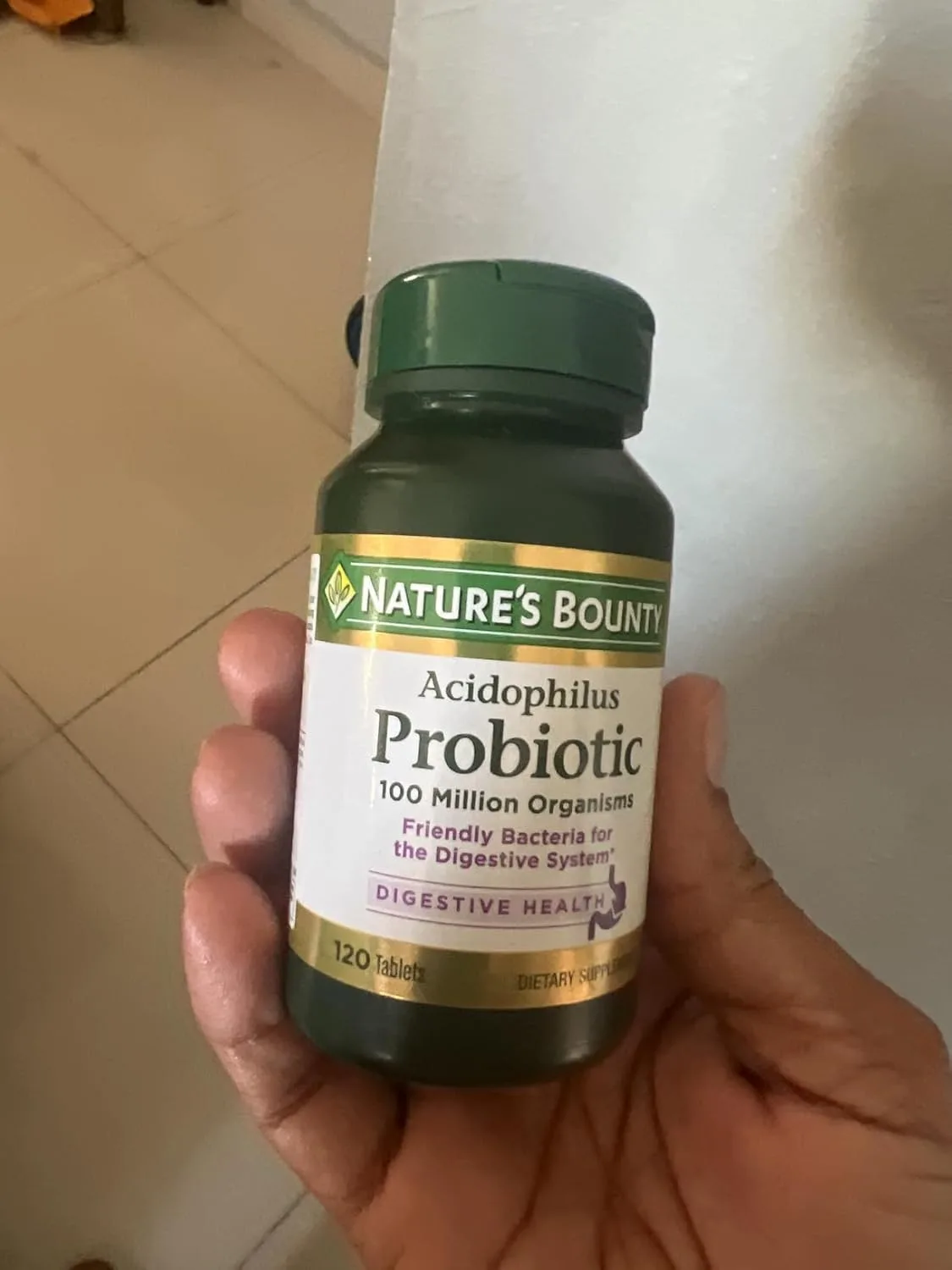 Customer photo of probiotic supplement bottle showing label and contents
