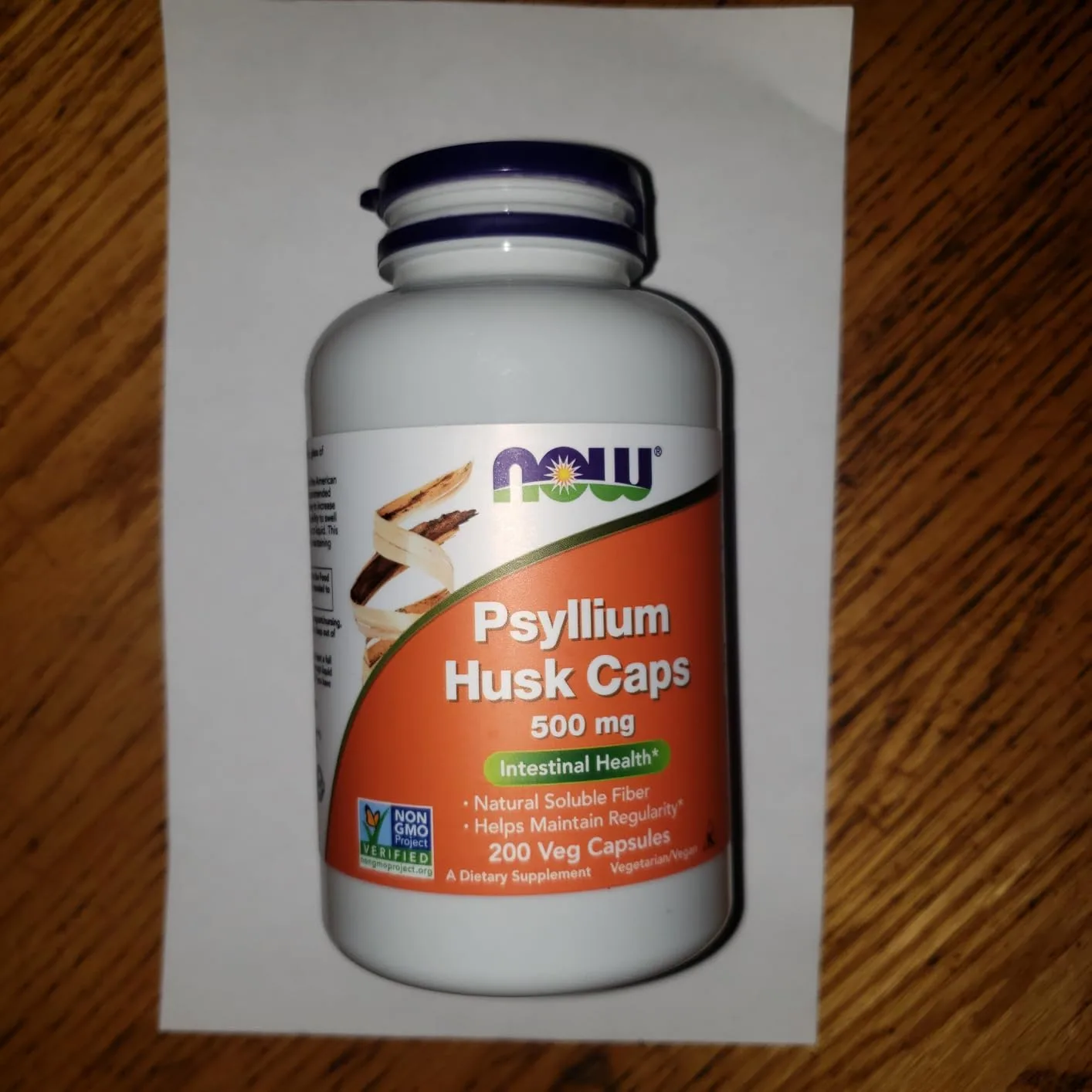Customer photo of digestive wellness supplement bottle with natural ingredients label