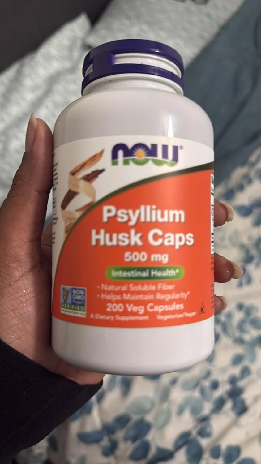 Customer photo of digestive wellness supplement bottle with natural ingredients label visible