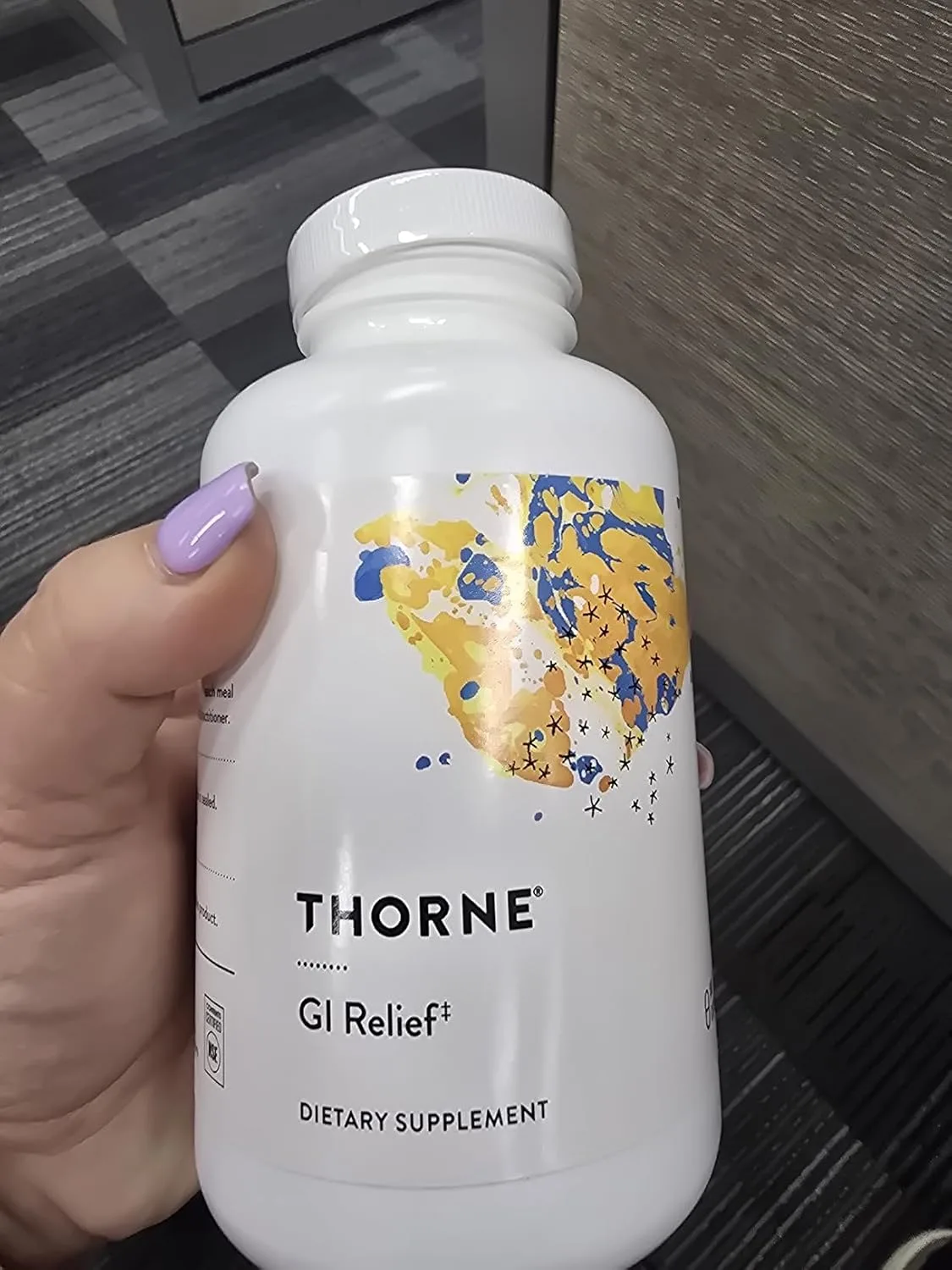 Customer photo of Thorne GI-Encap supplement bottle showing label and capsules