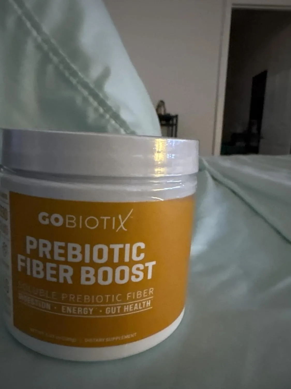 Customer photo of digestive supplement bottle displayed on bathroom counter