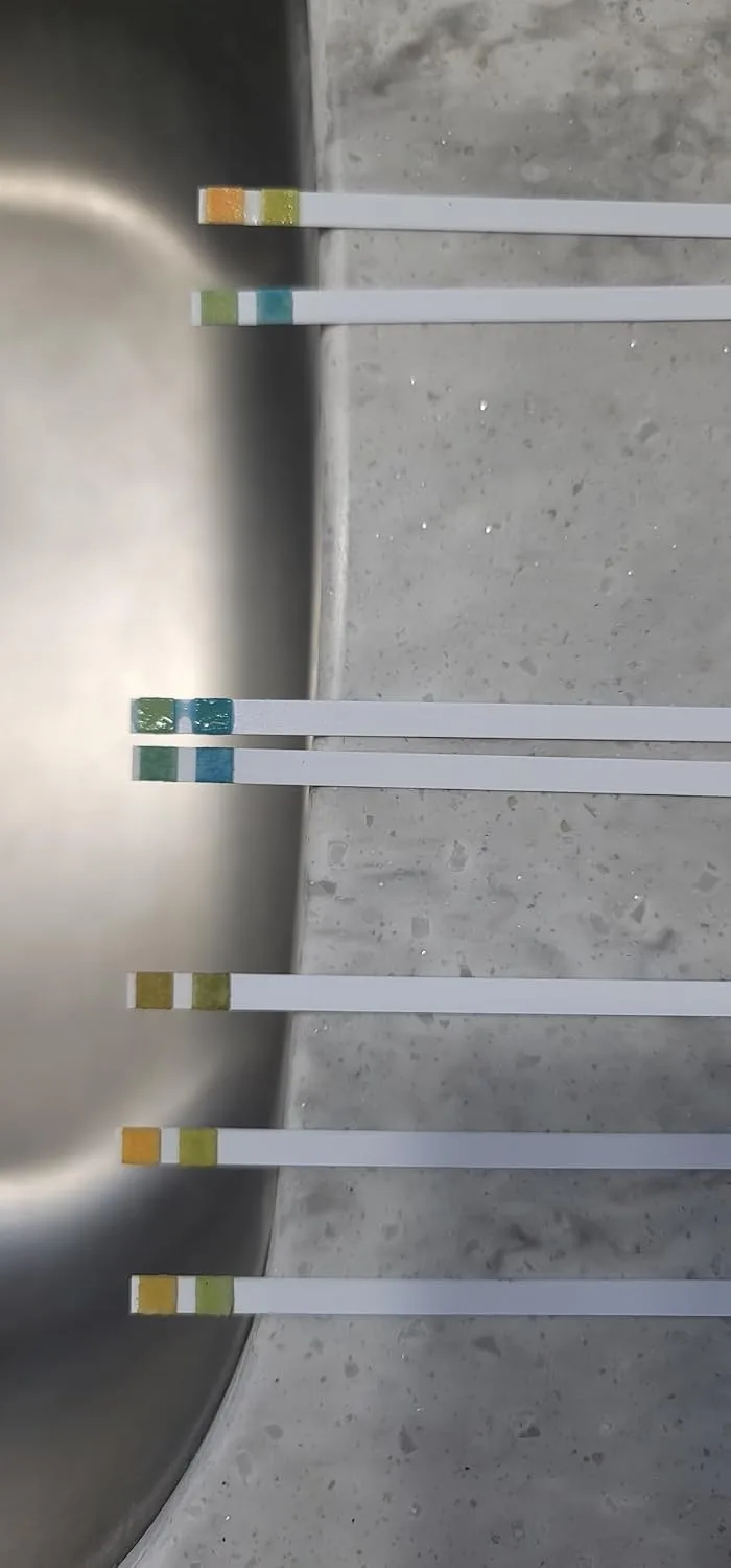 Customer photo of pH test strips being used to check stomach acid levels