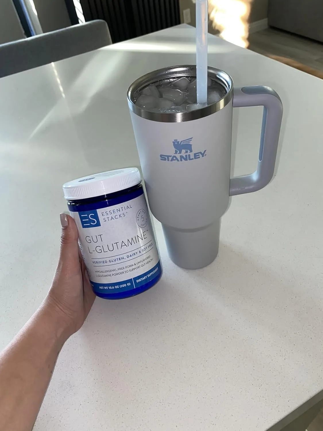 Customer photo of L-Glutamine powder supplement bottle and capsules