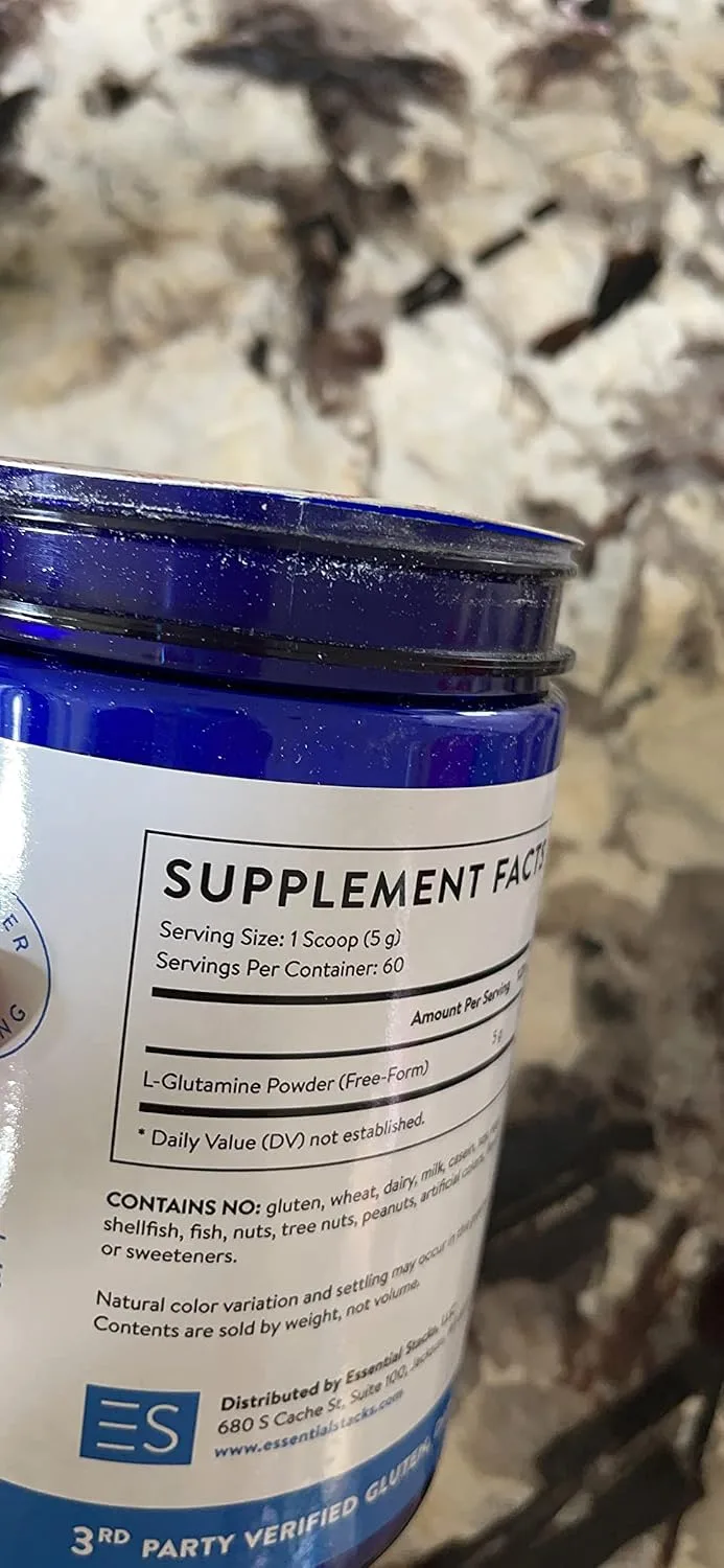 Customer photo of L-Glutamine powder supplement bottle and capsules
