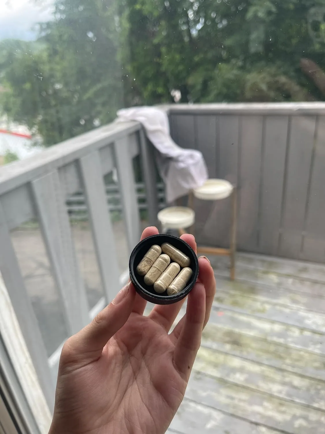Customer photo of probiotic supplement bottle and digestive wellness product packaging