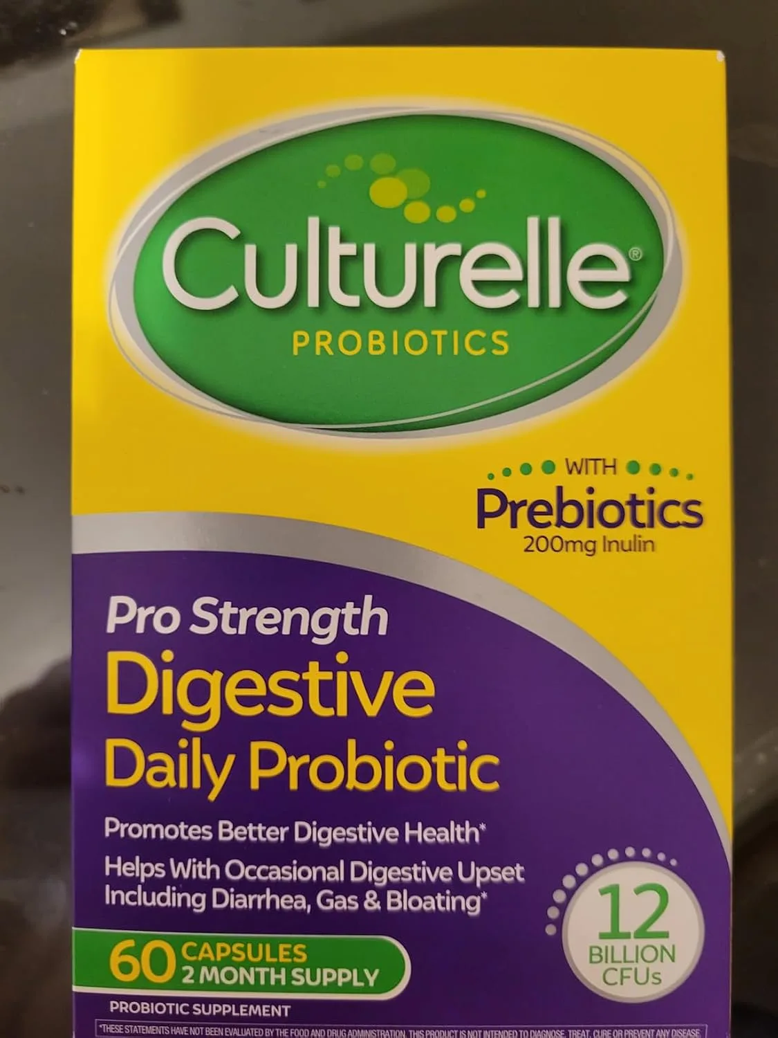 Customer photo of Culturelle Daily Probiotic capsules next to packaging