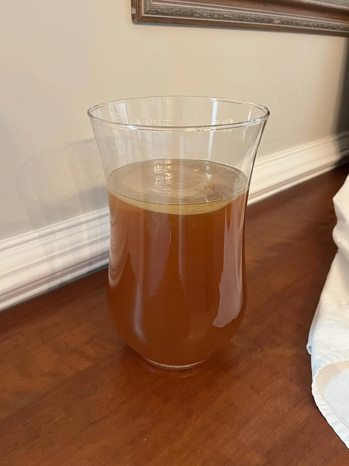 Customer photo of homemade kombucha bottles and fermentation jars from the starter kit