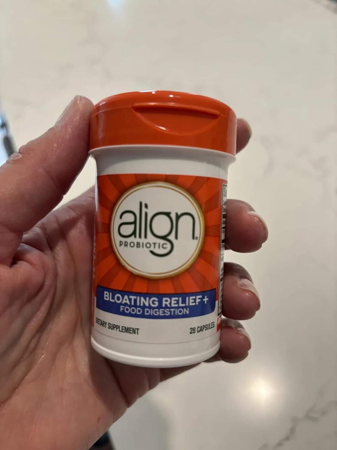 Customer photo of digestive supplement bottle showing product packaging and label details
