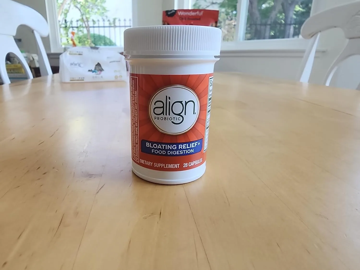 Customer photo of digestive supplement bottle with capsules displayed