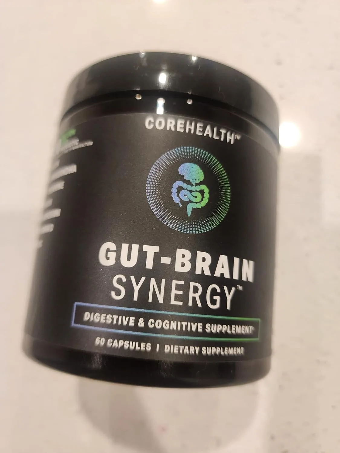 Customer photo of probiotic supplement bottle with capsules displayed